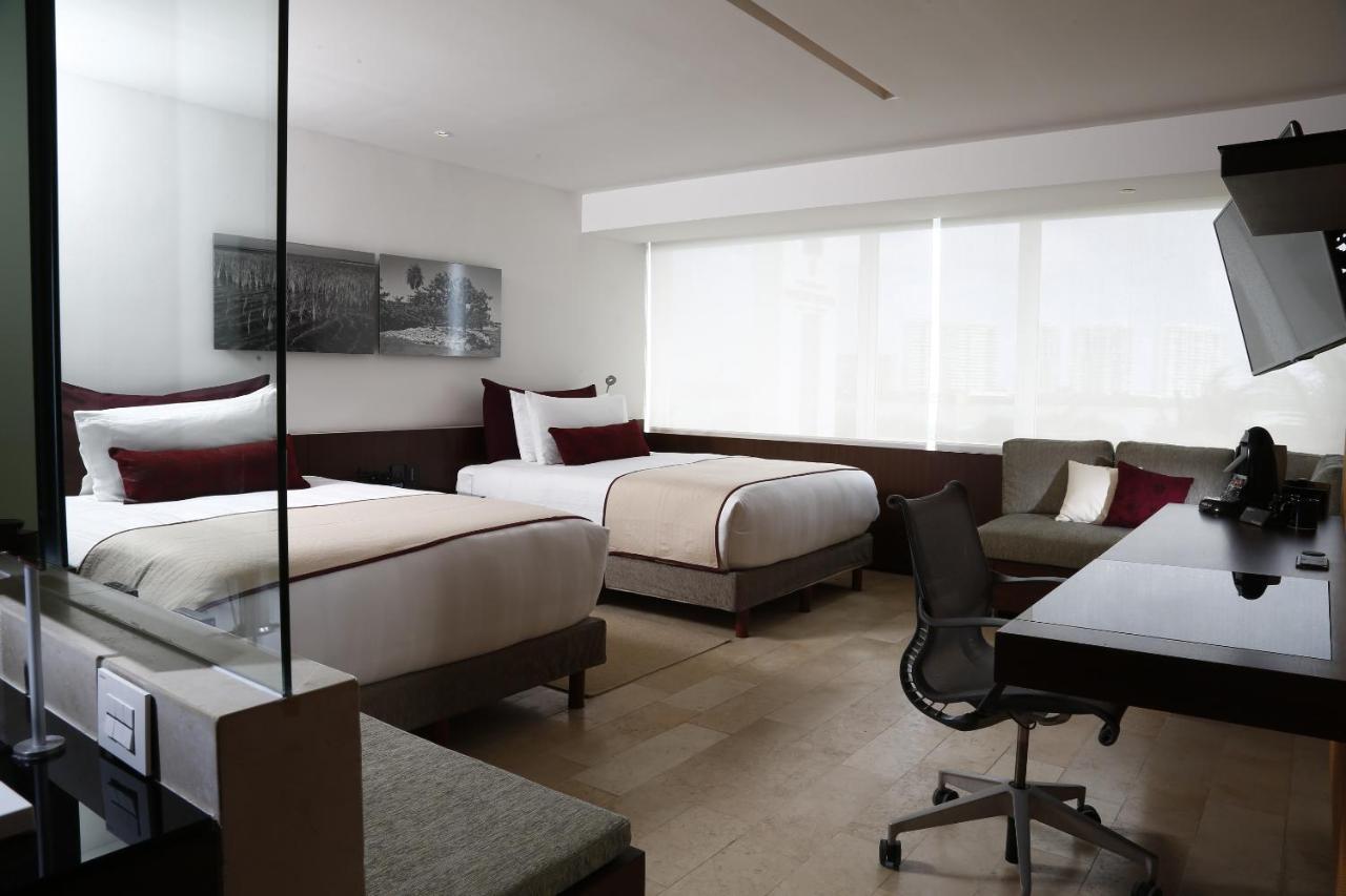 Classic Club Kamer met 2 Queensize Bedden en Uitzicht op de Oceaan