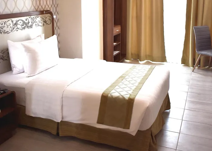 One Central Hotel&Suites