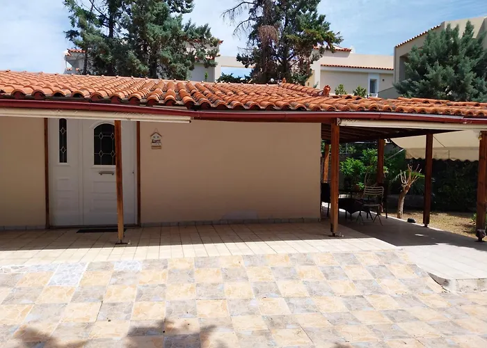 Ξυλινο Σπίτι Δίπλα Στην Θάλασσα