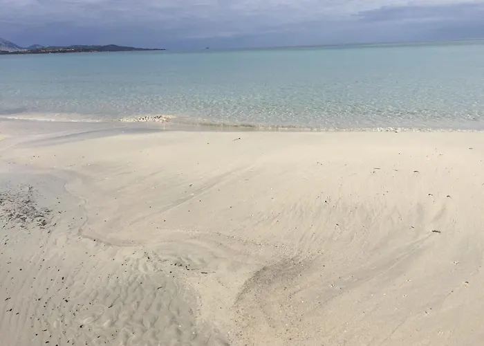 HOTEL Al FARO , SPIAGGIA LA CINTA ,SAN TEODORO