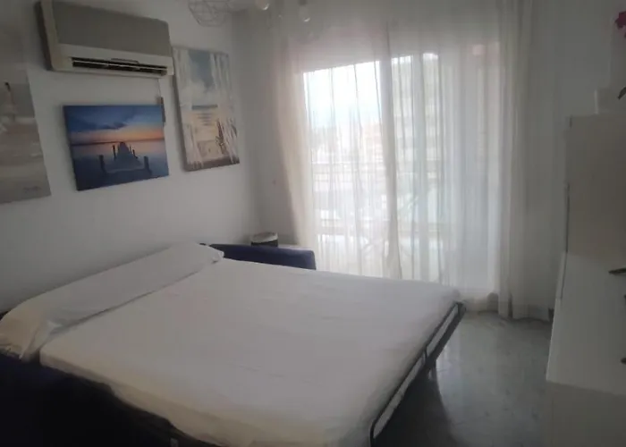Acogedor apartamento en Daimús a 150 metros de la playa con parking privado y piscinas comunitarias