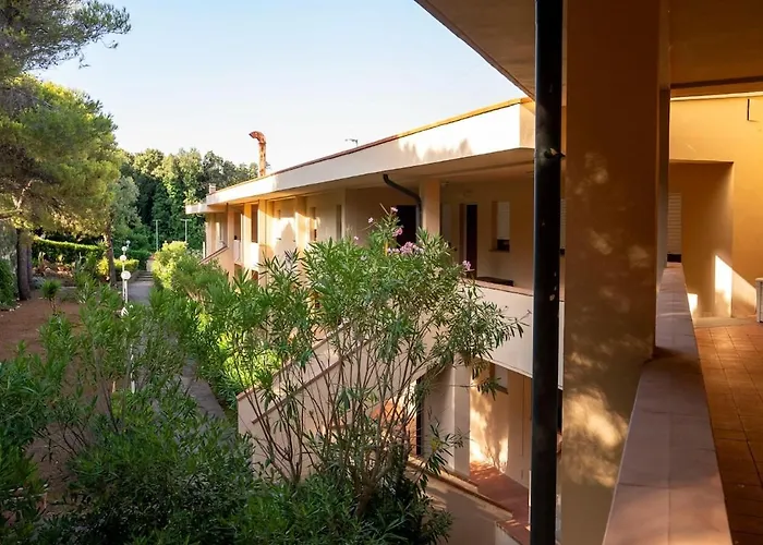 Appartamento in Residence con Piscina e Baia Privata