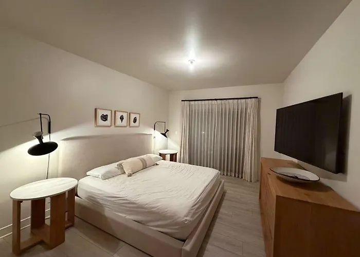 Modern 2BR Beach Walk Retreat with King&Coastal Vibe